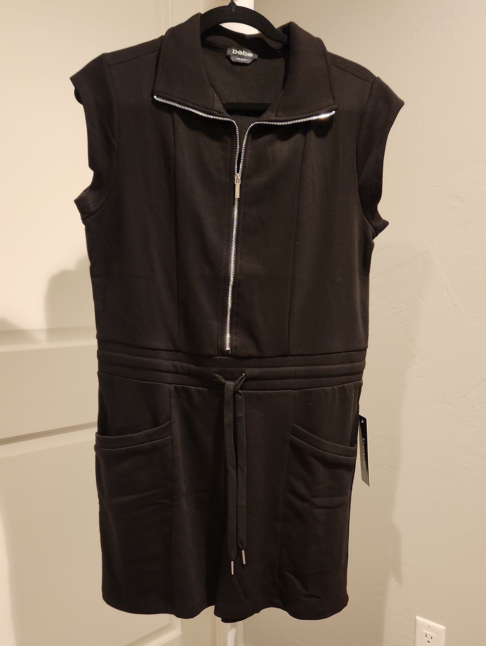 NWT- bebe Black Sleeveless Zip Front Drawstring Romper- Large